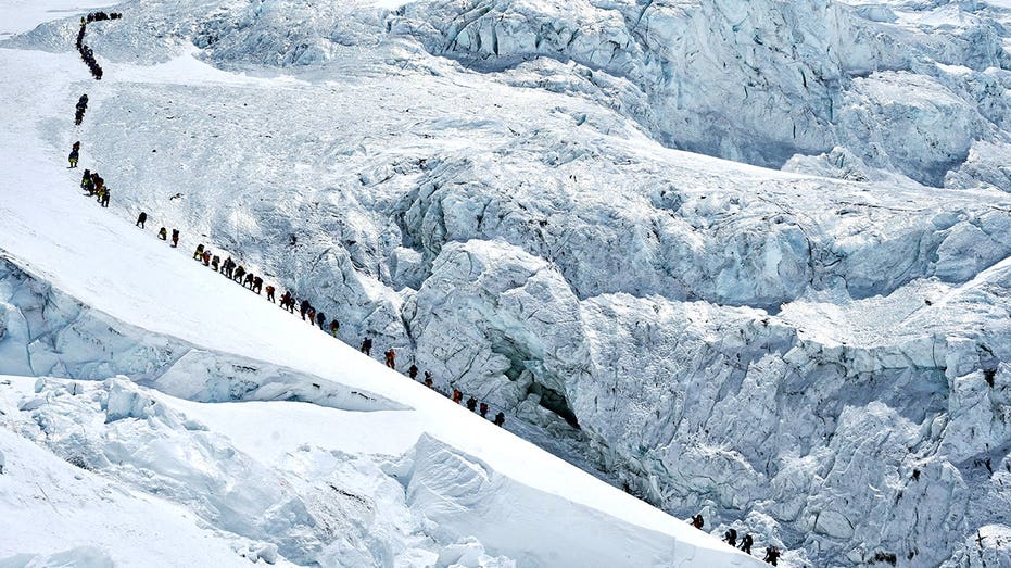 Record number of climbers summit Mount Everest from Nepali side despite overcrowding concerns
