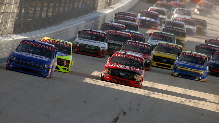 NASCAR tire carrier saves reporter from runaway pit box before Craftsman Truck Series race