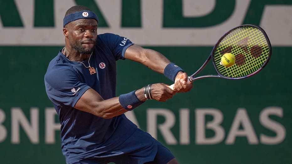 American Frances Tiafoe clashes with French Open opponent during comeback win