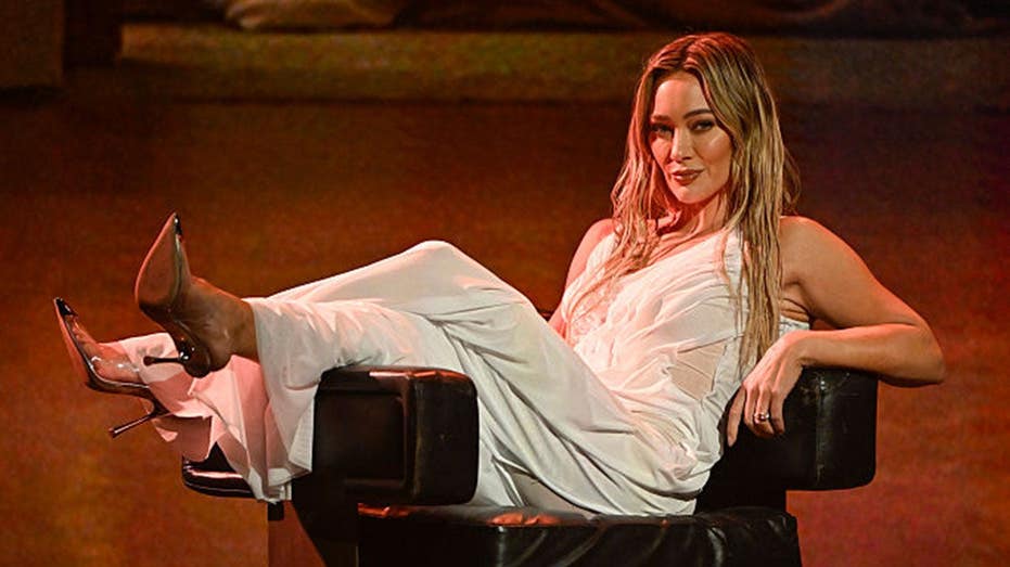 Hilary Duff makes her SI Swim cover debut, Carrie Underwood rocks out with Mötley Crüe & defending Banana-ball
