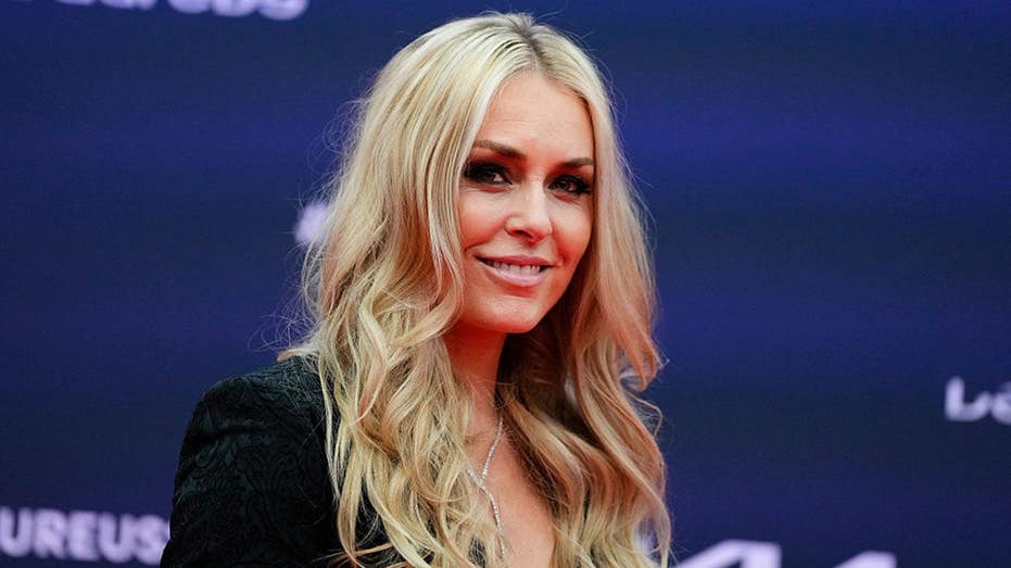 Lindsey Vonn ditches her undershirt in a fiery red pantsuit, Maggie Sajak is a force & coach attacks umpire!