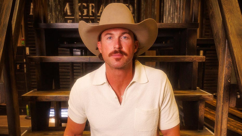 Country star Riley Green nearly dove into the crowd after a fan split his ear open during a performance