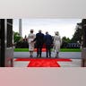 melania-trump-charle-camilla-behi8nd.jpg