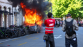 Anti-G7 protest turns violent as demonstrators torch Tesla and smash UN office windows - Fox News