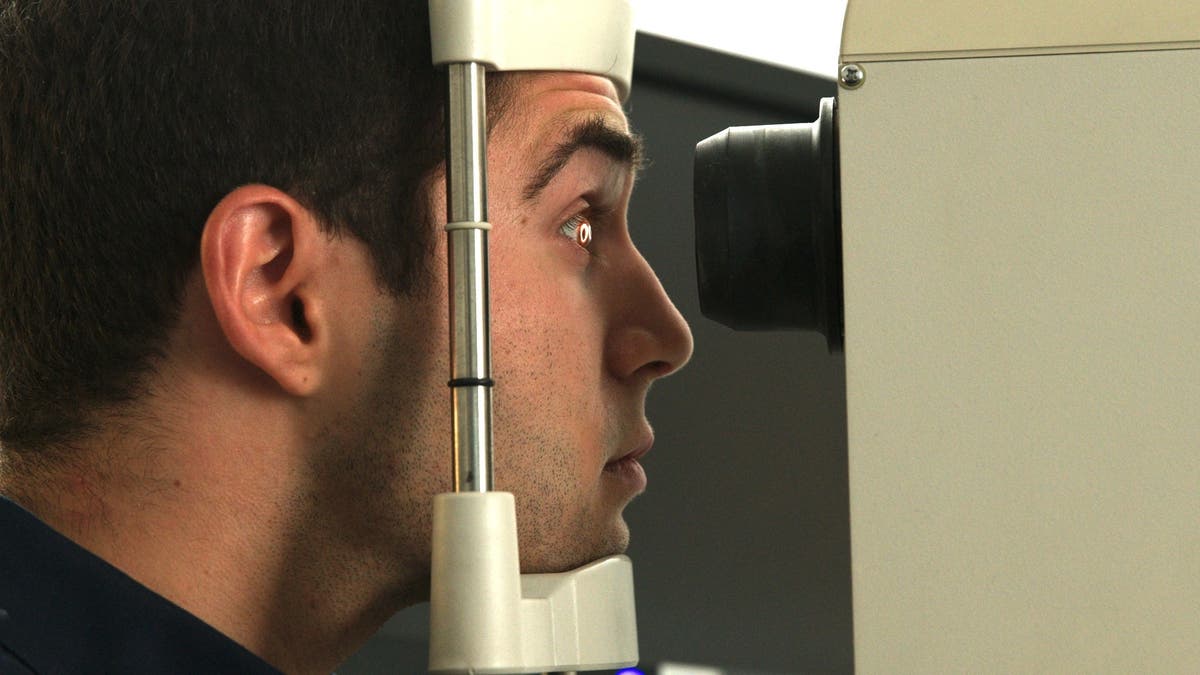 close up of man getting an eye exam