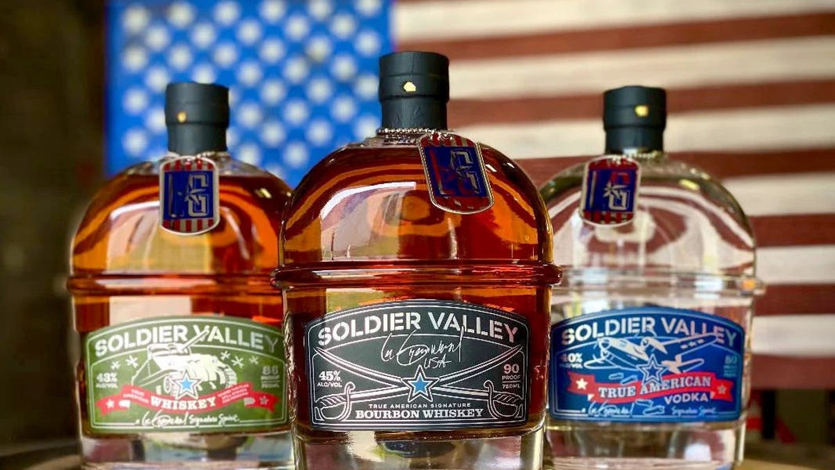 Three bottles of Soldier Valley Spirits sit on a table.