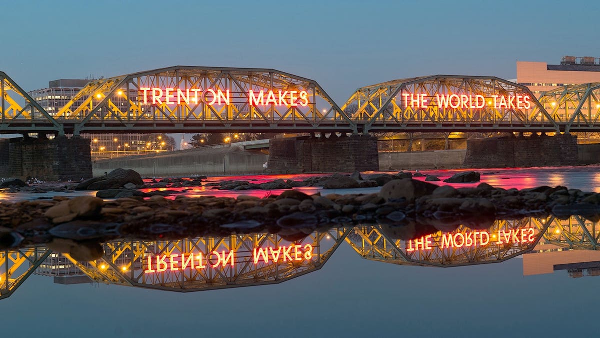 Trenton Makes The World Takes sign on bridge