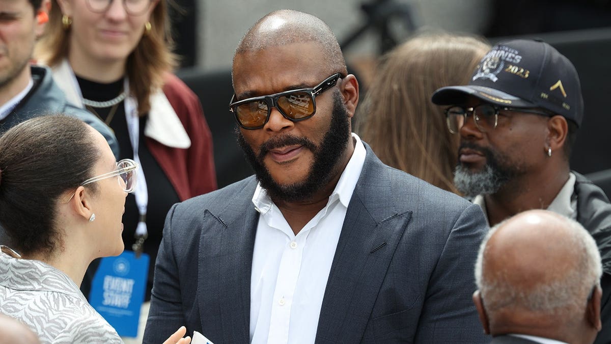 Tyler Perry arrives at the opening of Obama's Presidential Center
