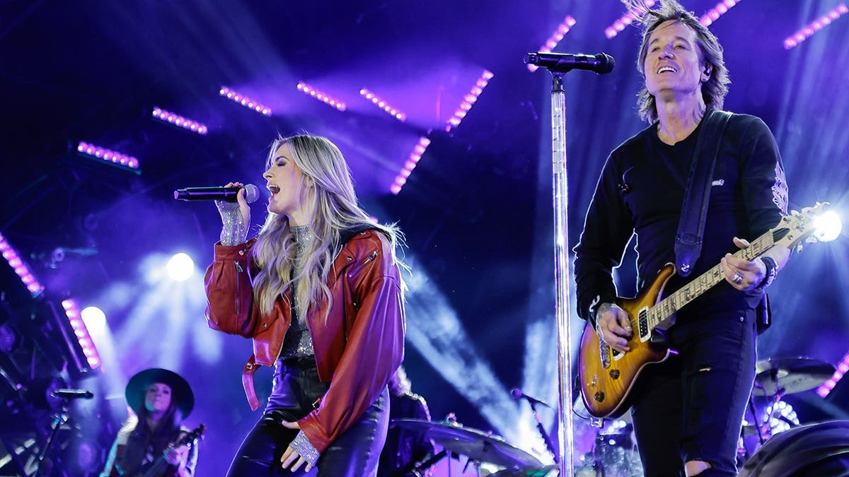 Alana Springsteen and Keith Urban on stage at the CBS Original Special New Year's Eve Live event in December 2024.