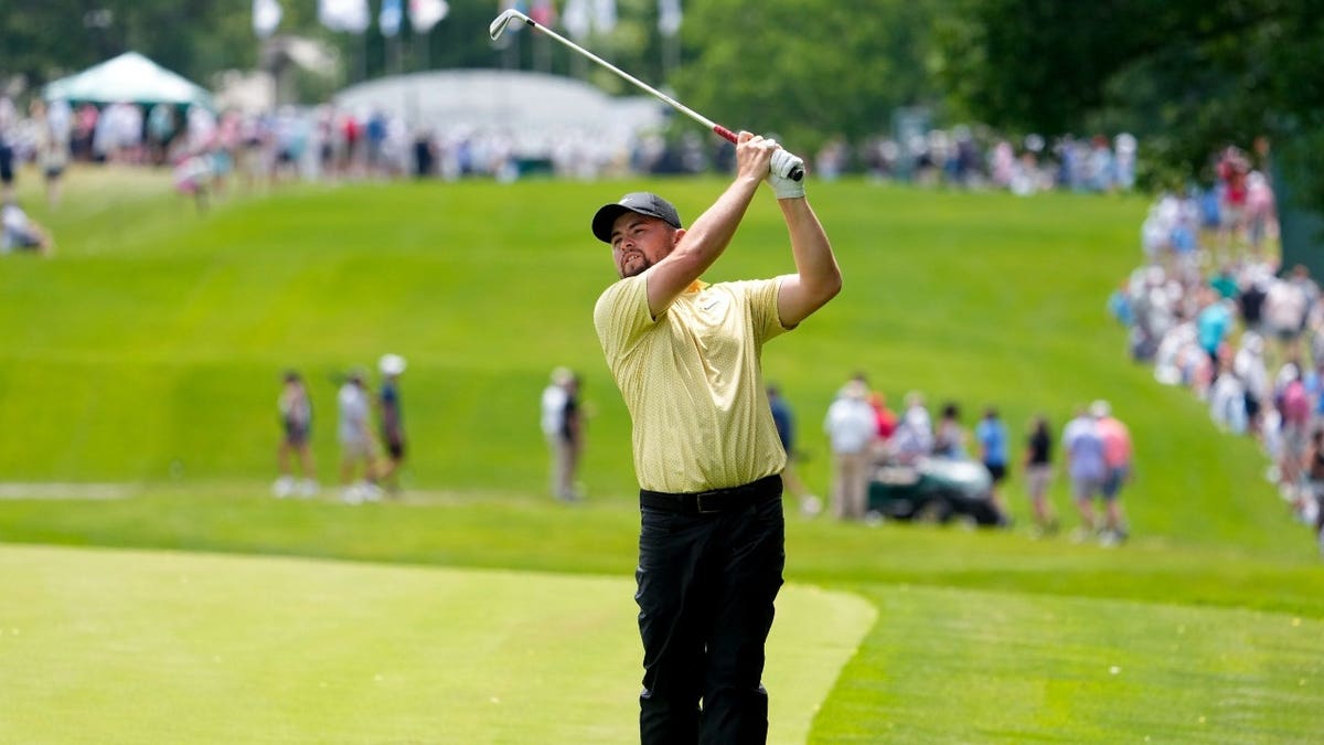 Alex Fitzpatrick hits an approach shot during the third round of the 2026 Memorial Tournament at Muirfield Village Golf Club in Dublin, Ohio.