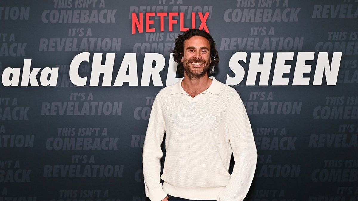 Andrew Renzi standing at Netflix aka Charlie Sheen ATAS Official event in Los Angeles