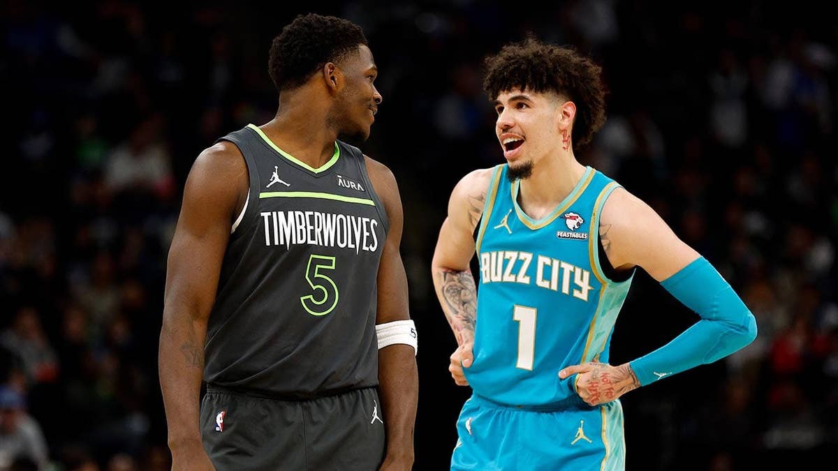 Anthony Edwards and LaMelo Ball interacting during a basketball game at Target Center in Minneapolis