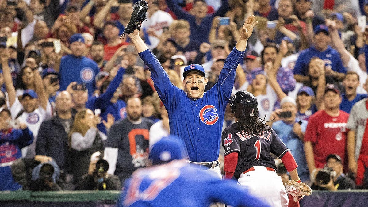 Chicago Cubs Anthony Rizzo celebrating on field after final out in World Series game