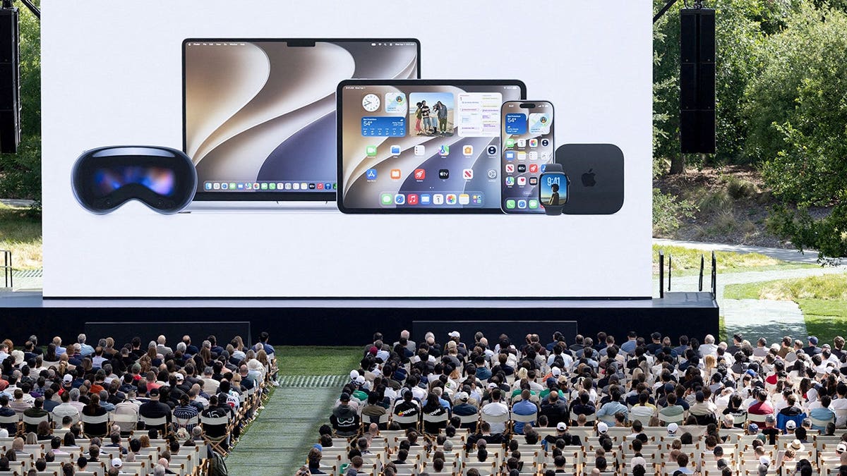 Attendees watching a presentation at Apple's Worldwide Developers Conference in Cupertino, California