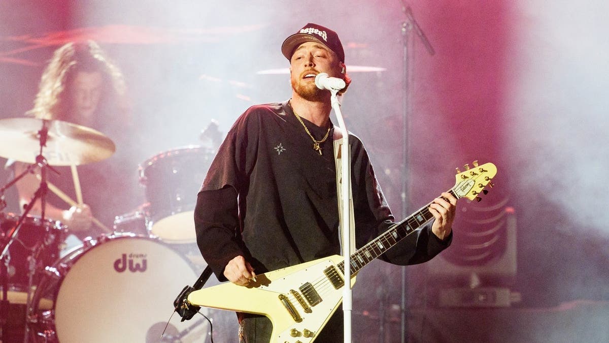 Bailey Zimmerman performing on stage at Caesars Superdome in New Orleans, Louisiana.