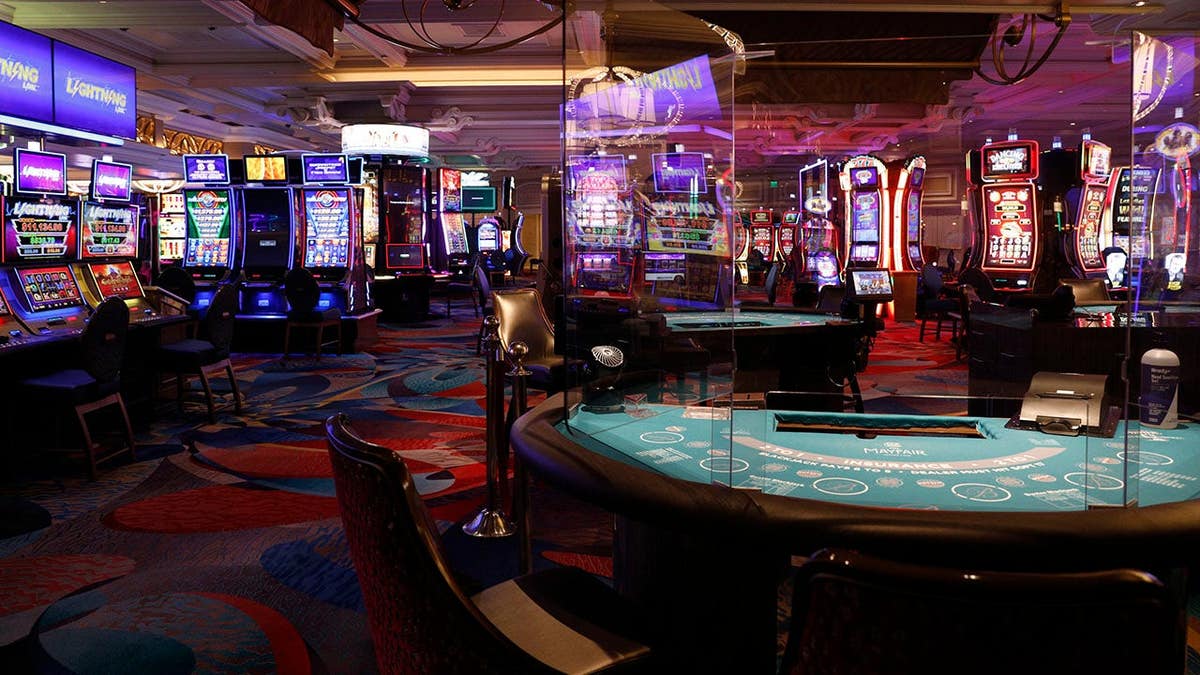 Plexiglass dividers installed connected  gaming tables astatine  Bellagio Resort and Casino successful  Las Vegas Nevada