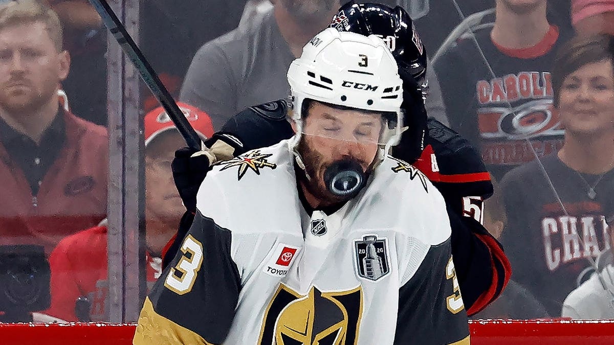 Vegas Golden Knights' Brayden McNabb takes a puck to the face during NHL Stanley Cup Final game.