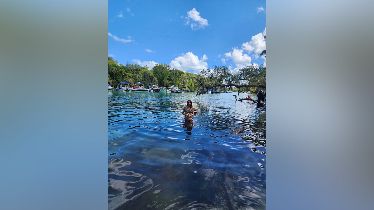 Brittany Clark standing in a Central Florida waterway before the fatal alligator attack