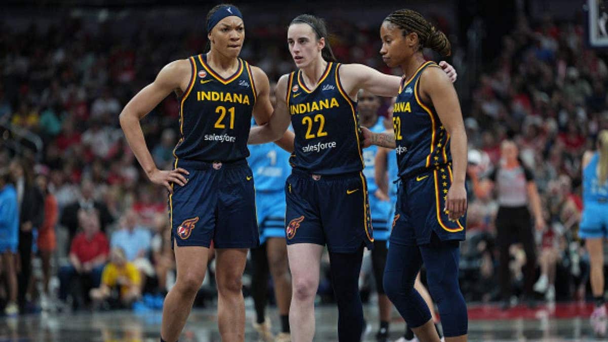 Indiana Fever’s Makayla Timpson, Caitlin Clark and Tyasha Harris huddle during matchup against Chicago Sky. (Photo by A.J. Mast/NBAE via Getty Images)