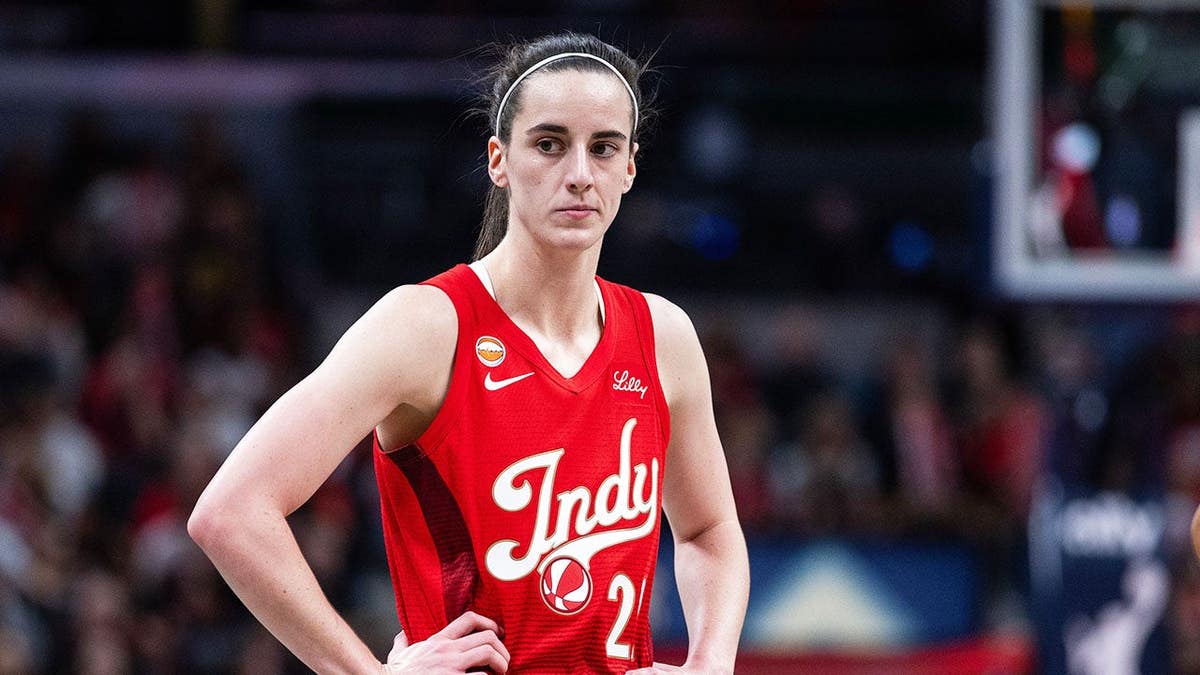 Indiana Fever guard Caitlin Clark dribbling basketball at Gainbridge Fieldhouse