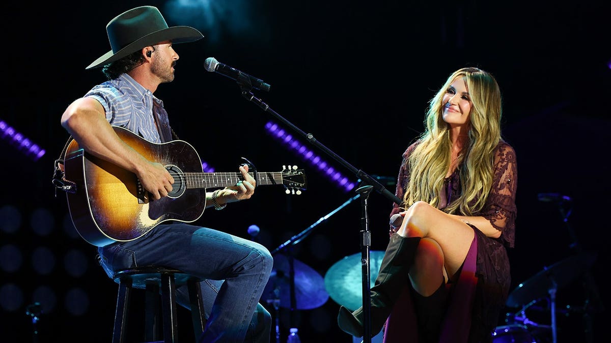 Carly Pearce and Riley Green performing together at CMA Fest in Nashville, Tennessee in June 2026.
