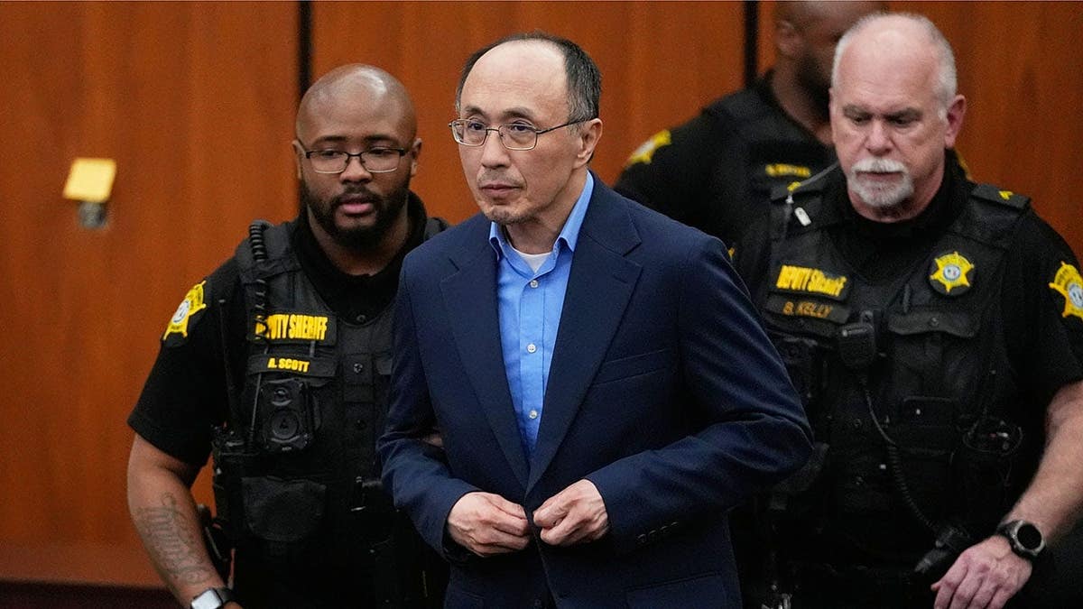 Chikei Rick Chow escorted out of courtroom after not guilty verdict