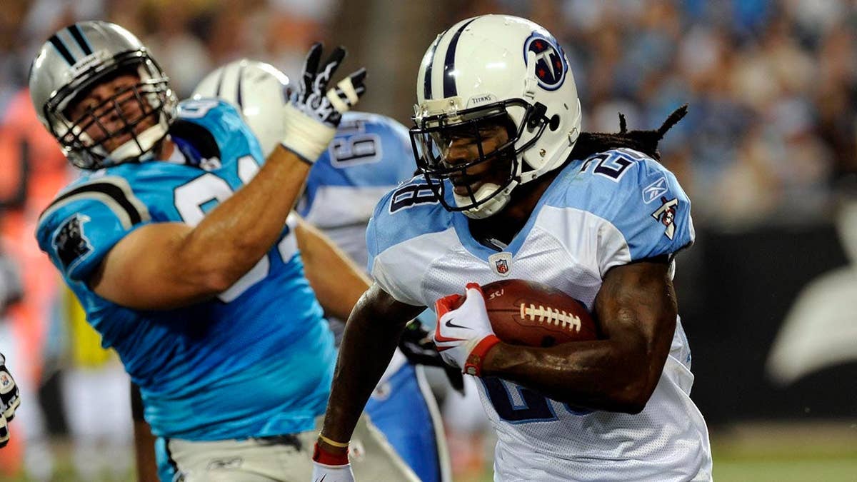 Chris Johnson running with football against Carolina Panthers at Bank of America Stadium