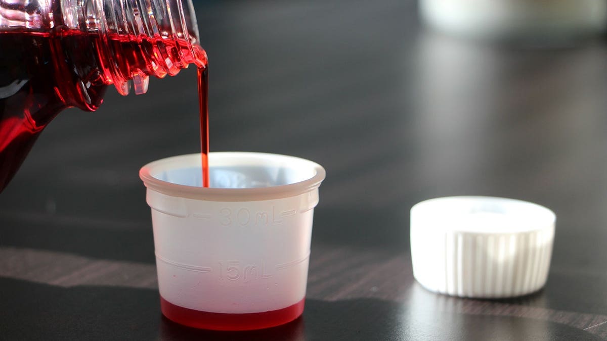 A bottle of cold syrup medicine