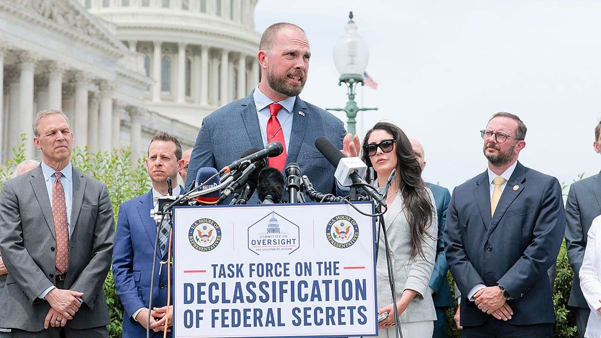 David Grusch speaking at a news conference outside the US Capitol Building in Washington, DC