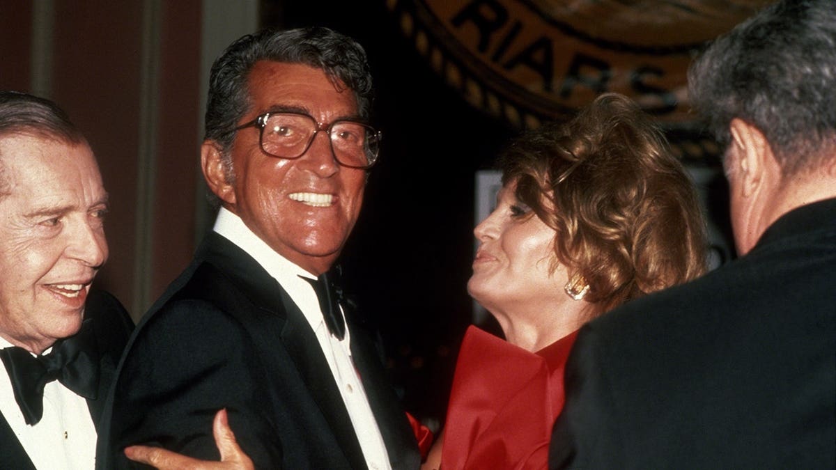 Dean Martin and Angie Dickinson standing together in New York City.