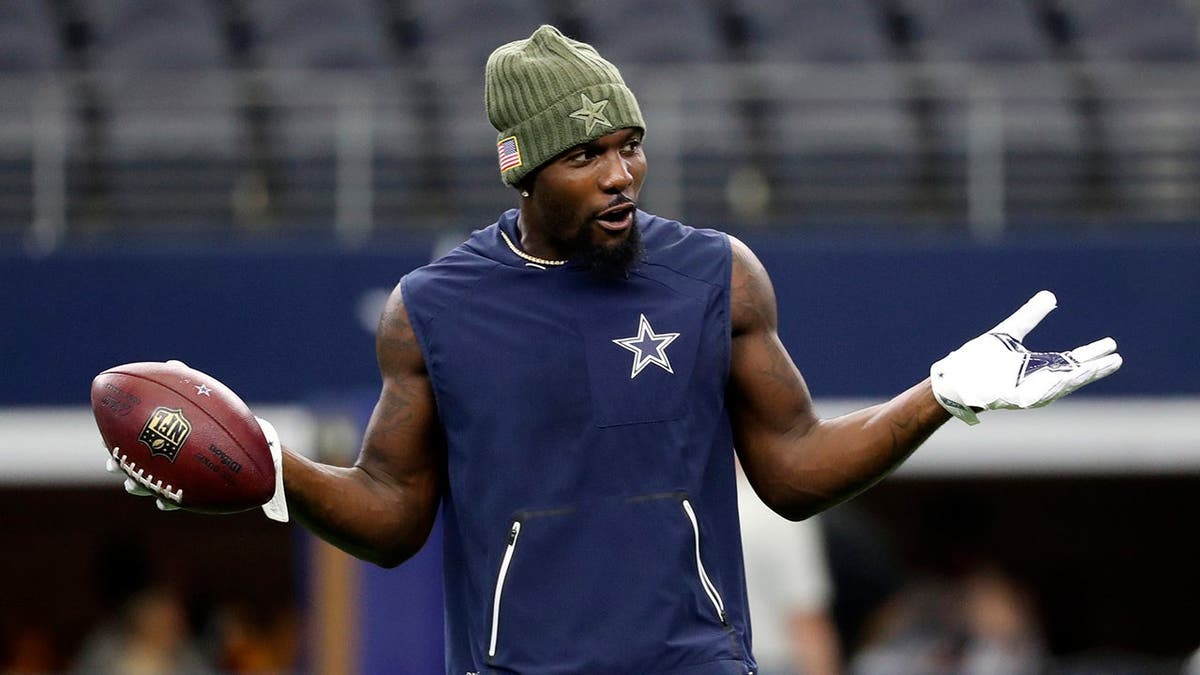 Dallas Cowboys wide receiver Dez Bryant warming up on the field at AT&T Stadium.