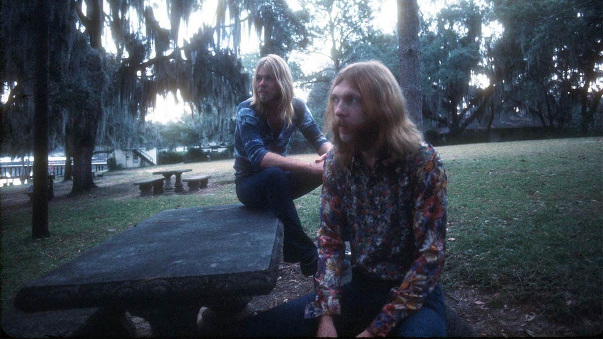 Duane Allman and Gregg Allman standing together in Muscle Shoals, Alabama.