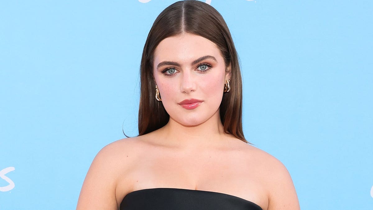 Ella Bright standing on the red carpet at the Off Campus premiere in Los Angeles
