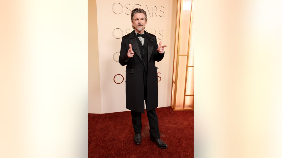 Ethan Hawke standing at Dolby Theatre in Hollywood, California.