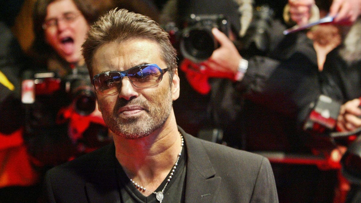 British pop star George Michael walking over the red carpet at the Berlin Film Festival.