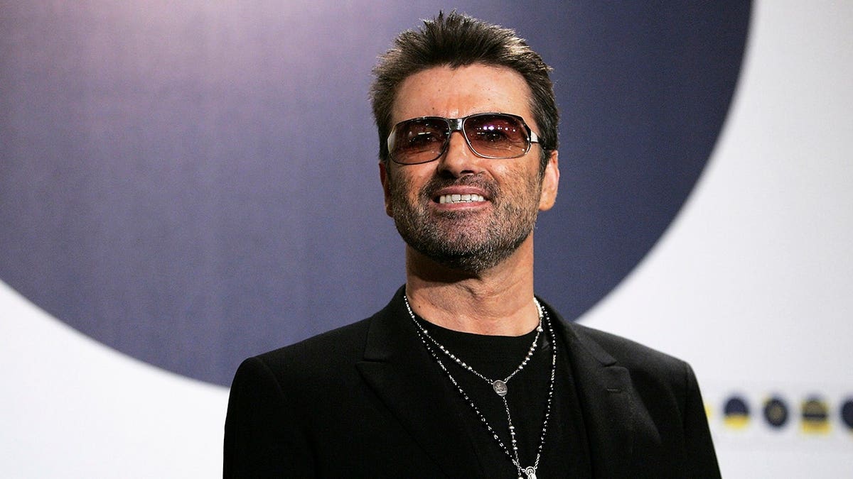 Singer George Michael posing at the Berlinale International Film Festival photocall in Berlin