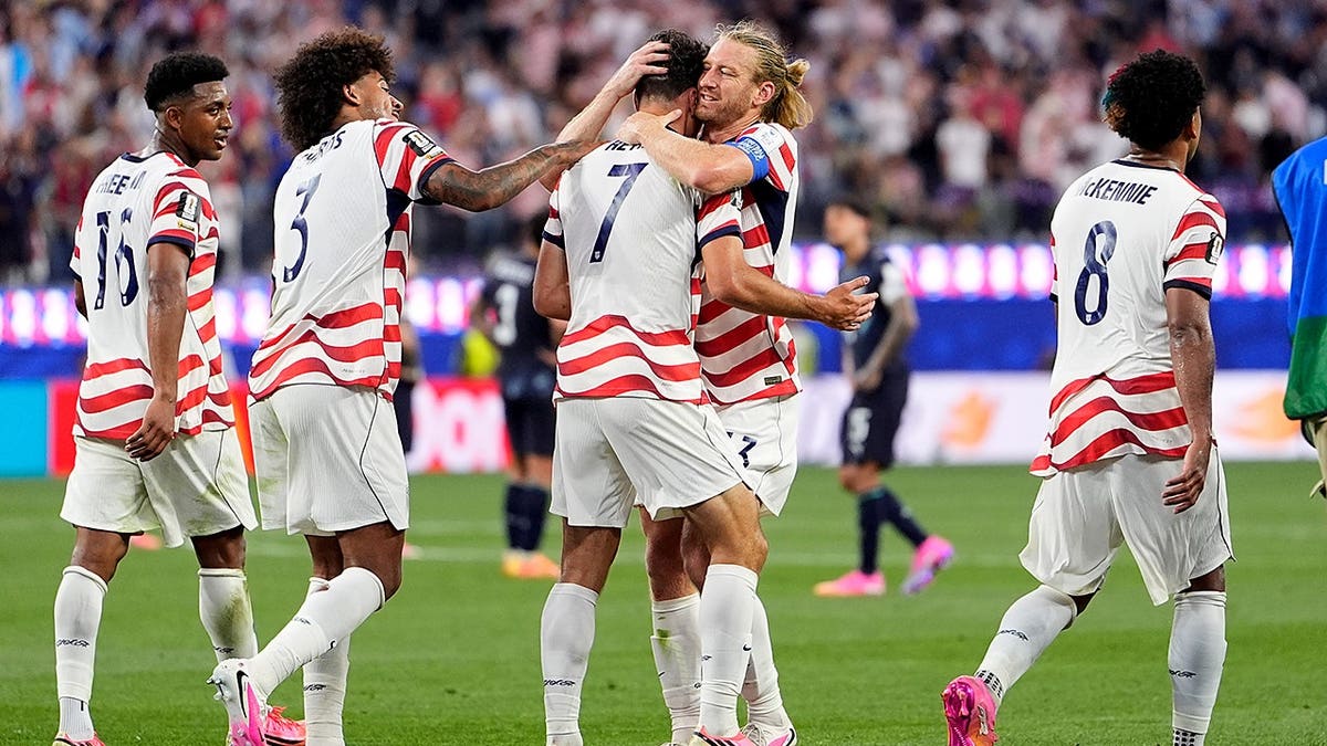 United States' Giovanni Reyna celebrating with teammates aft  scoring a extremity   successful  a shot    match.