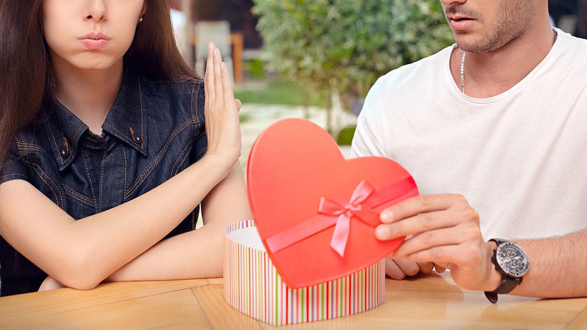 Materialist girlfriend refusing a present from her loved one