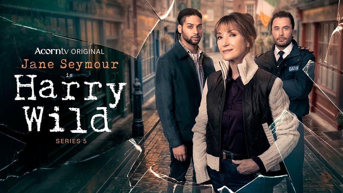 Jane Seymour standing with two cast members in a promotional image for the television series