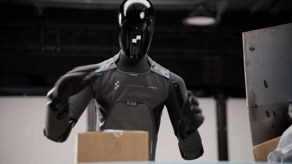 A humanoid robot packing boxes