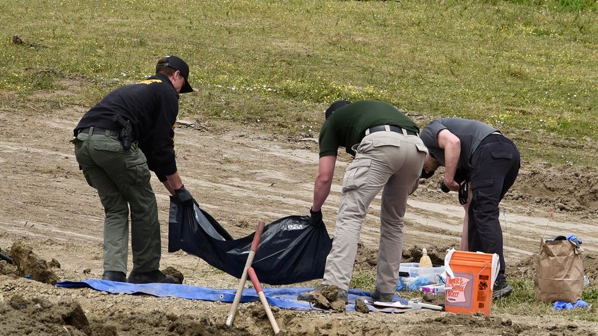 image shows deputies searching property and a tarp
