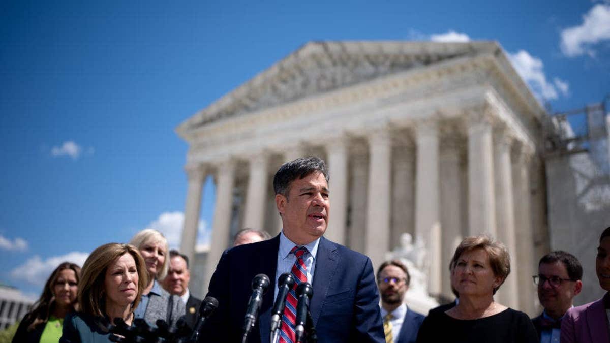 Idaho Attorney General Raul Labrador speaking outside the Supreme Court in Washington, D.C.