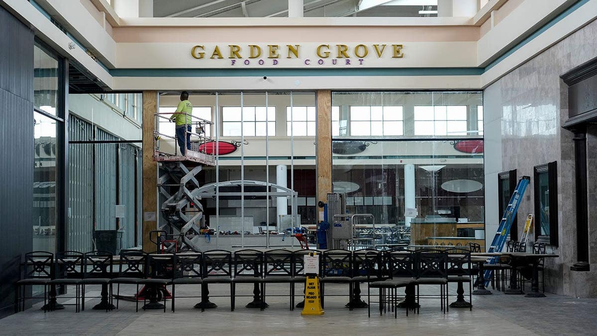 Crews working inside Indian River Mall during demolition.