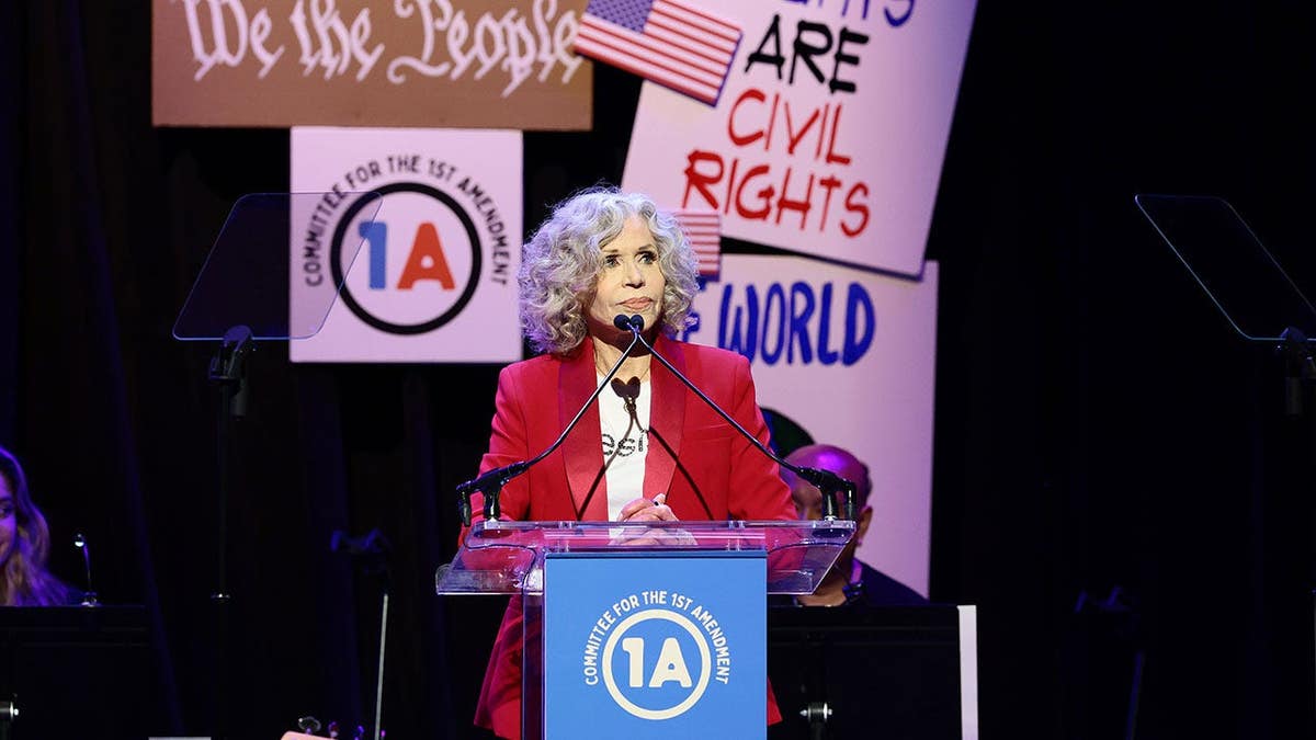 Jane Fonda speaking onstage during the Committee for the First Amendment Concert in New York City