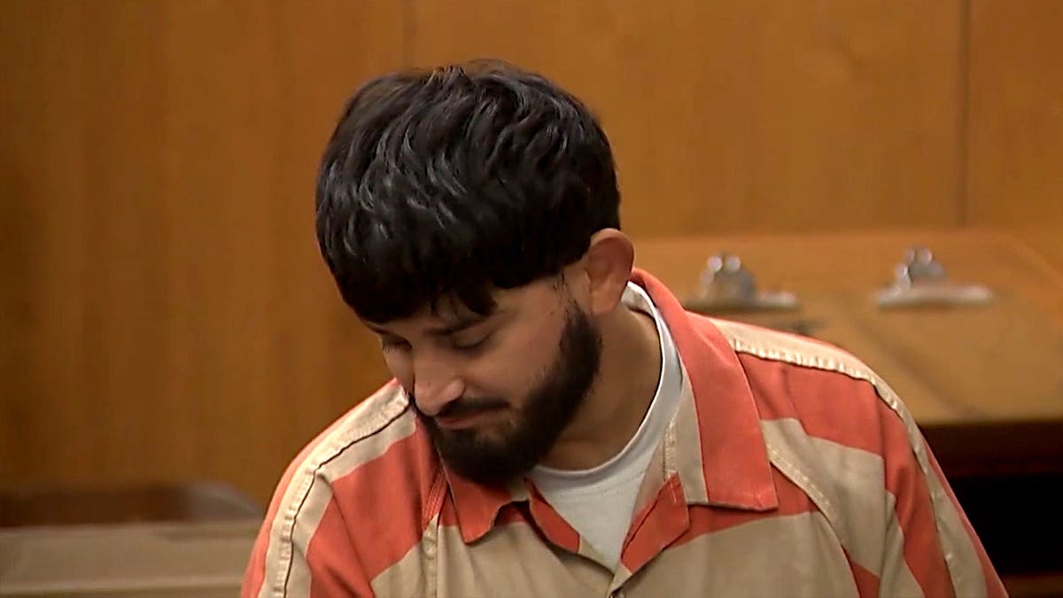 Joaquin Escoto appears in Stanislaus County Superior Court after being charged in the deaths of a mother, newborn child and grandmother in Modesto, California