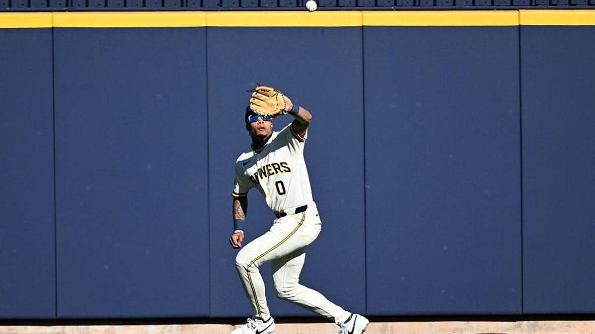 Jordyn Adams of the Milwaukee Brewers catching a fly ball at American Family Fields of Phoenix.