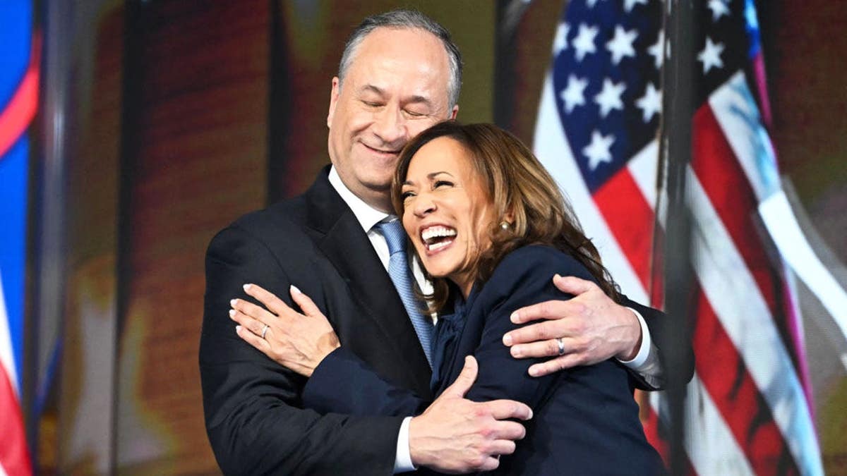 Vice President Kamala Harris hugging Second Gentleman Douglas Emhoff at the Democratic National Convention in Chicago