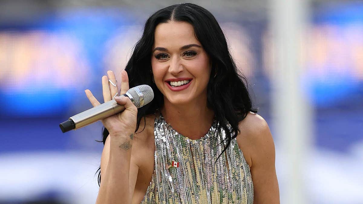 Singer-songwriter Katy Perry performing on stage at Los Angeles Stadium.