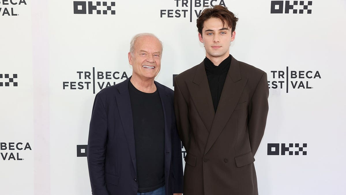 Kelsey Grammer and William Franklyn-Miller standing together at the Young Washington premiere.