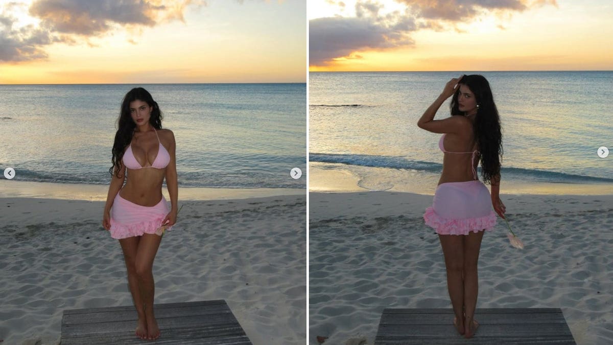 Kylie Jenner on the beach in Turks & Caicos in a pink bikini.
